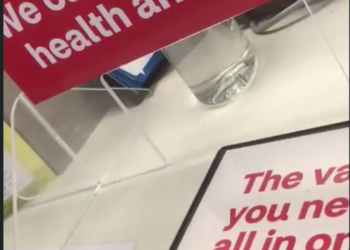 Woman politely asks a CVS pharmacist to pull a Moderna safety insert from package.  It’s blank!