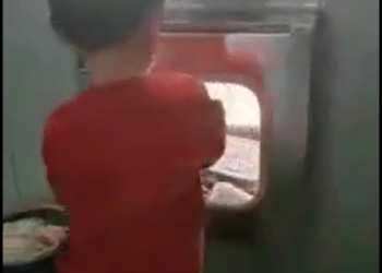 Chinese boy in a lock down quarantine camp