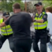 Child screams as Dutch police baton the public in Almelo who have gathered in support of the Dutch farmers mural reading “no farmers, no food” which the mayor has ordered to be removed.